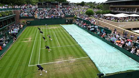 Play Resumes After Rain At Wimbledon On Saturday .